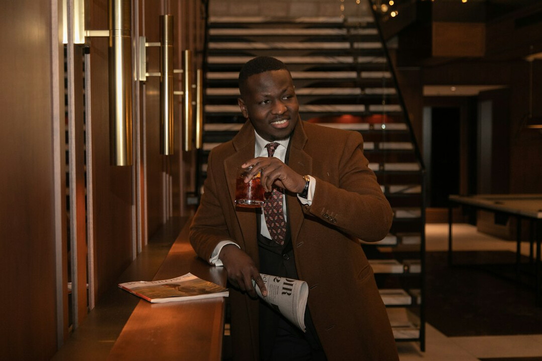 Media law advisor reviewing documents with a producer